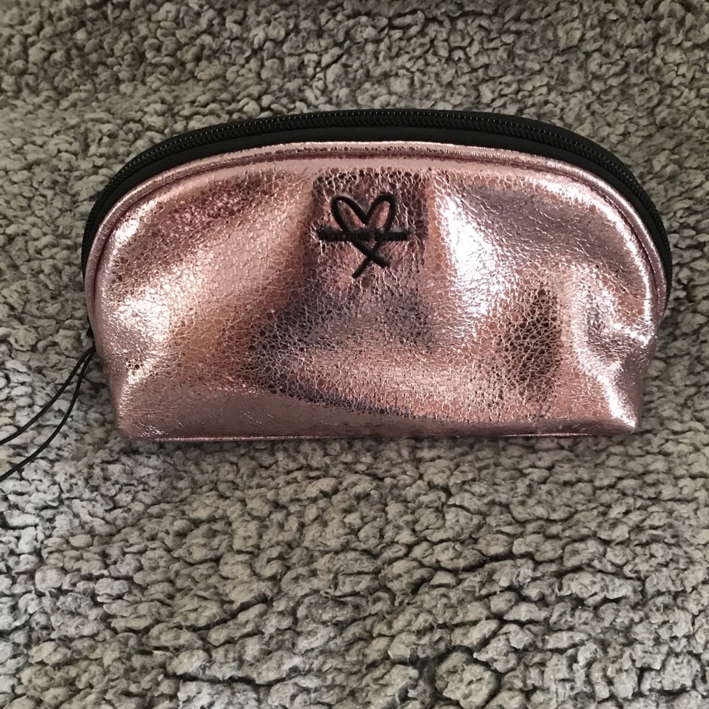 Victoria’s Secret rose gold small makeup bag